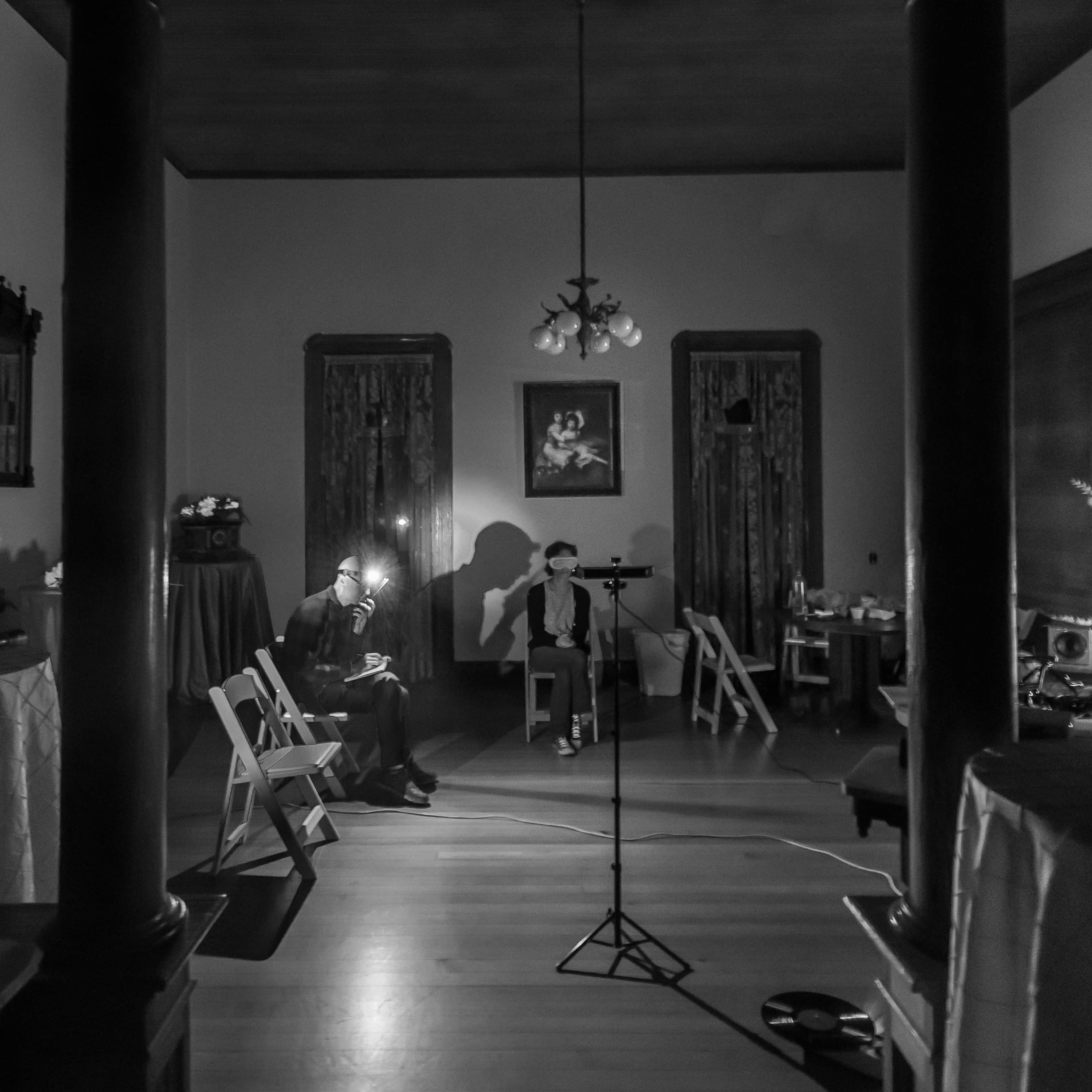 Photography: JD Crane An invigilated sitting in a darkened parlor, with a blindfolded sitter and a note-taking investigator